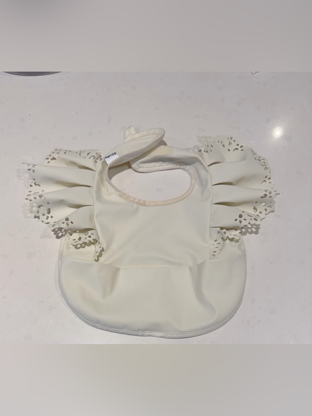 Elodie Baby Bib with Ruffle Sleeves - Cream